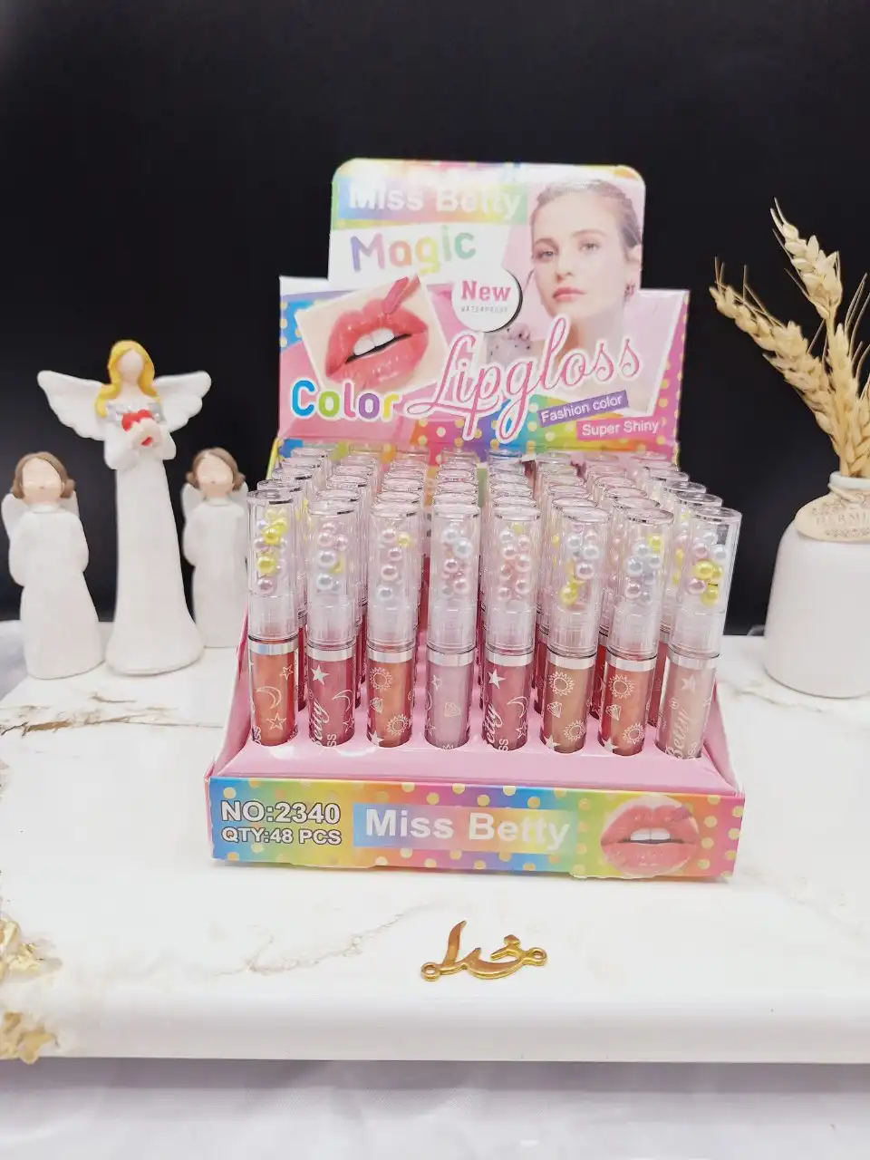 لیپ گلاس شاینی مروارید دار Miss Betty کد 2340