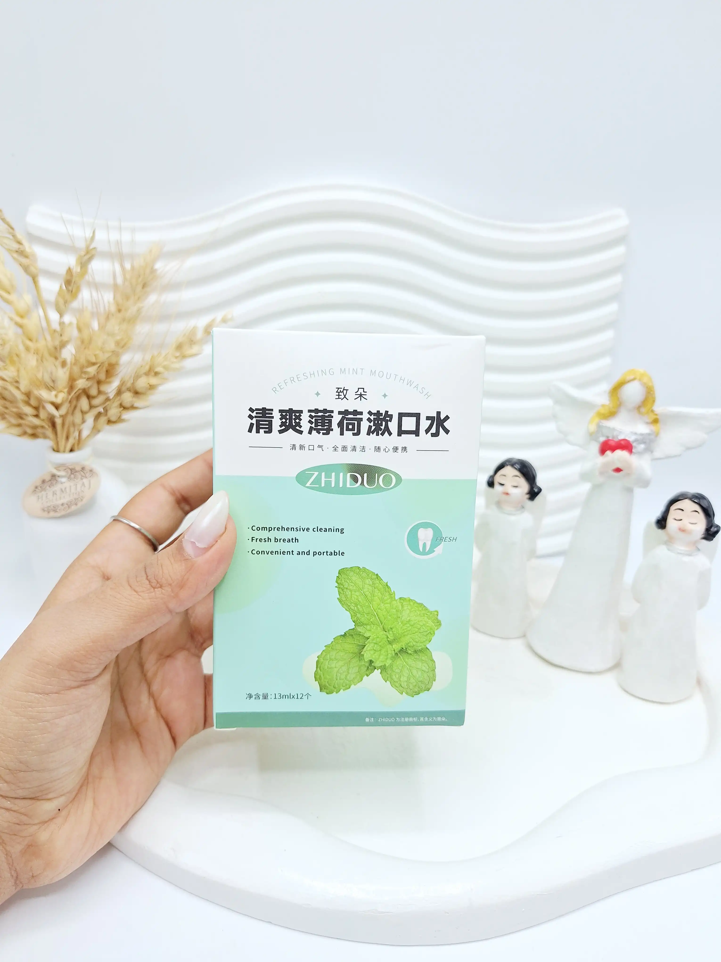 دهانشویه دونه ای طراوت بخش نعنا ZHIDUO کد 3435